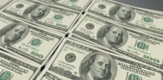 La FED progetta un aumento degli interessi per controllare l’inflazione 100 dollari