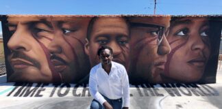 Intervista all’Avv. Hilarry Sedu: l’Italia che cambia Hilarry Sedu davanti al murale di Jorit